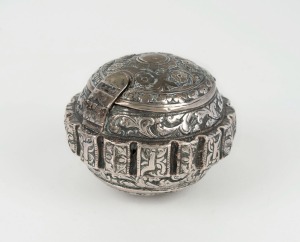 Antique Malaysian Silver Tobacco Box (Chelpa) Of broadly spherical form with a shaped apron with scalloped edge.