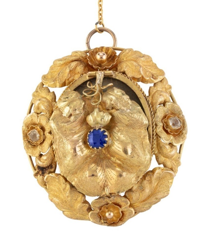 An imposing antique Colonial Australian yellow gold oval brooch set with blue and white stones, articulated front with mourning window, 19th century, ​​​​​​​5.5cm high, 15.2 grams total