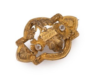 A Colonial 15ct yellow gold "Forget Me Not" brooch, 19th century, 4cm wide