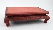 A Chinese red lacquered stand with carved decoration, 19th/20th century, ​​​​​​​15cm high, 52cm wide, 35cm deep - 2