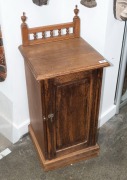 An antique pine pot cupboard, late 19th century, ​​​​​​​73cm high, 40cm wide, 38cm deep