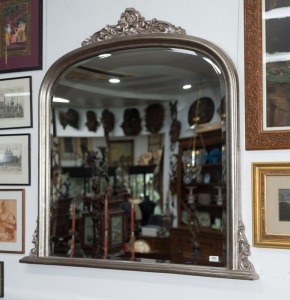 A reproduction silver gilt framed overmantel mirror, 21st century, 118cm high, 123cm wide