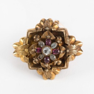 An Australian Colonial antique yellow gold brooch set with purple and white stones, reverse incorporating a mourning window, 19th century, 4.3cm wide, 12.5 grams total