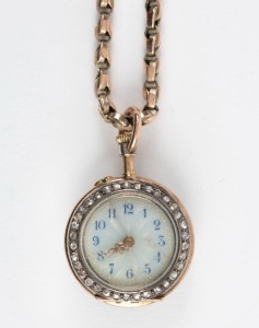 WILLIAM DRUMMOND & Co. Melbourne, Swiss made antique gold pocket watch encrusted with diamonds, suspended on a rose gold chain, early 20th century,