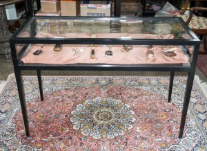 A jewellery display cabinet with black painted finish, 20th century, 80cm high, 120cm wide, 50cm deep