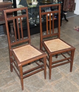 A pair of antique English mahogany chairs with barber pole inlay and rattan seats, circa 1900, ​​​​​​​93cm high