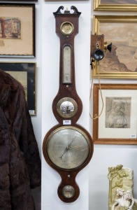 An antique English 8 inch wheel barometer in mahogany case with ebony and boxwood stringing and swan neck pediment, circa 1880, 97cm high, 26cm wide