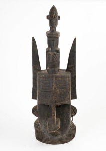 A tribal mask with figural top, carved wood and iron, African origin,  ​​​​​​​81cm high