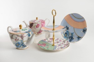 WEDGWOOD: A "Butterfly Bloom" table setting comprising of teacup & saucer sets (2, new in box); a teapot with lid (small) and a large teapot with lid (1 ltr.); two 20cm plates, and a Butterfly Bloom two-tier cake stand. [Current Price from Wedgwood: $1270
