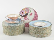 WEDGWOOD: A "Butterfly Bloom" table setting comprising of teacup & saucer sets (2, new in box); a teapot with lid (small) and a large teapot with lid (1 ltr.); two 20cm plates, and a Butterfly Bloom two-tier cake stand. [Current Price from Wedgwood: $1270 - 2