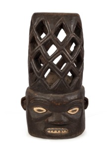 A tribal lineage mask carved, wood with remains of painted finish, Cameroon, 70cm high PROVENIENCE: the Christensen collection (cat.ref.CC 40015)