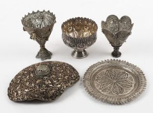 Eastern silver filigree dish and egg cups, silver bowl and silver plated Javanese belt buckle, (5 items), the buckle 10cm wide