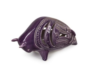 ELLIS pierced pottery bull statue with rare purple glaze, incised "Ellis, F38", 16cm high, 30cm long