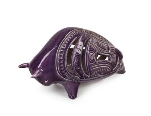 ELLIS pierced pottery bull statue with rare purple glaze, incised "Ellis, F38", ​​​​​​​16cm high, 30cm long
