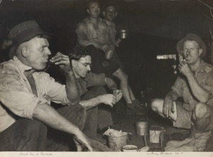 MAXWELL SPENCER DUPAIN (1911 - 1992), Lunch hour at Cessnock, silver gelatin print, titled, signed and dated '48 in lower margin, 37 x 50cm.