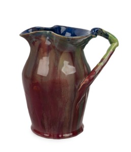 REMUED early pottery jug with lustrous pink glazed body, green handle and rich blue interior, incised "Remued 54Z", 25cm high