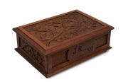 An Australian Arts & Crafts box, carved jarrah, engraved "J.R. 1903", Western Australian origin, 19th/20th century, 14cm high, 38cm wide, 27cm deep - 2