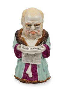 "MELBOURNE ARGUS" Staffordshire porcelain figural tobacco jar, 19th century, 25cm high