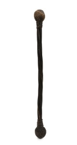 A quartermaster's antique cosh, baleen with cloth covered lead weighted ends, 19th century, 34cm long