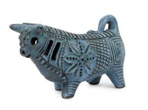 McLAREN blue glazed pottery bull, incised "McLaren", 19cm high x 30cm long