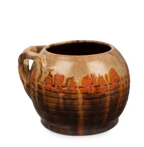 REMUED spherical pottery vase with applied branch handle, glazed in orange and brown, incised "Remued 53/S", 11cm high, 16cm wide