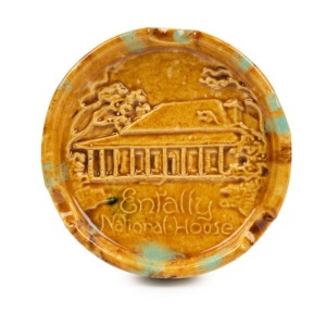JOHN CAMPBELL "ENTALLY NATIONAL HOUSE" pottery ashtray with majolica glaze. incised "John Campbell, Tasmania", 12cm diameter. Note: this only the second example known to our rooms. Entally House was built in 1819 for Thomas Reibey, son of Mary Reibey. Mary was transported as a convict to Sydney and later became a successful business woman and is now commemorated on the Australian $20 note.