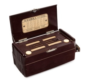 A.W.A Radiola burgundy bakelite portable valve radio, 22cm high 