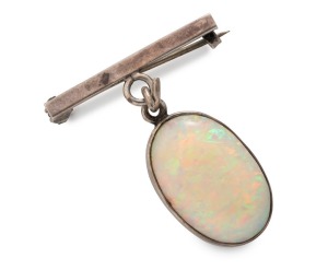 An Australian silver and solid Coober Pedy white opal brooch, early 20th century, 3cm high overall