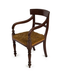 An Australian cedar spade back carver or library chair, New South Wales origin, circa 1850, 60cm across the arms