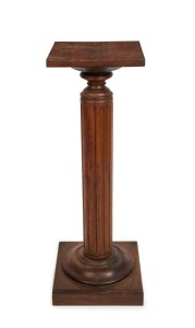 An antique kauri pine fluted pedestal, 19th century, 111cm high, 38cm diameter