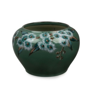 DAISY MERTON hand-painted green glazed pottery vase with gum blossoms, stamped "NEWTONE POTTERY, SYDNEY, Hand Painted", 11.5cm high, 16cm wide