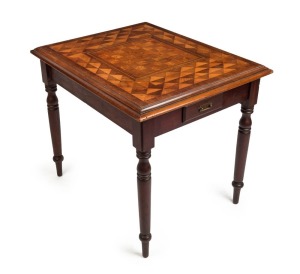 An antique Australian cedar games-top centre table, inlaid with Australian and New Zealand timbers including totara, musk, myrtle, kauri and hoop pine, blackwood and casuarina, New South Wales origin, circa 1870, 75cm high, 87cm wide, 71cm deep