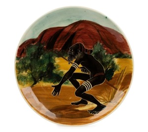 MARTIN BOYD pottery plate with an aboriginal warrior in landscape, incised "Martin Boyd, Australia", ​​​​​​​26cm diameter