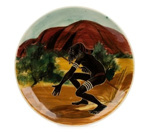 MARTIN BOYD pottery plate with an aboriginal warrior in landscape, incised "Martin Boyd, Australia", 26cm diameter