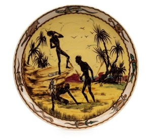 GUY BOYD pottery charger with aboriginal warriors in landscape, incised "Guy Boyd, Australia", 39cm diameter