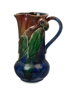 PAMELA pottery vase with applied gumnuts and leaves, glazed in pink, blue and green, incised "Pamela, Hand Made, 1934", ​​​​​​​19.5cm high