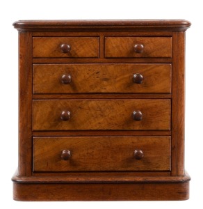 An Australian cedar apprentice chest of five drawers with full cedar secondary timbers, circa 1870, 49cm high, 49cm wide, 26cm deep