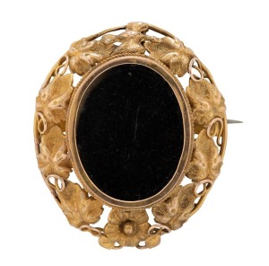LAMBORN & WAGNER (attributed) Colonial 15ct yellow gold oval brooch with bird and foliate decoration, circa 1870, 5cm high