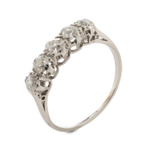 A vintage 18ct white gold ring, set with five brilliant cut graduated white diamonds, early to mid 20th century,