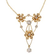 An antique 9ct gold Belle Époque necklace, set with seed pearls and white stones, circa 1905, 38cm long, 5.9 grams