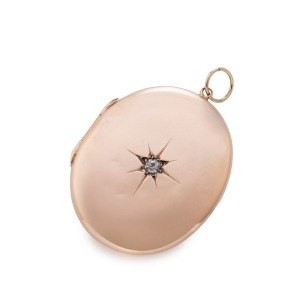 A.J. LONG of Melbourne 9ct gold oval locket set with a diamond, 19th/20th century, 5cm high overall, 10 grams total