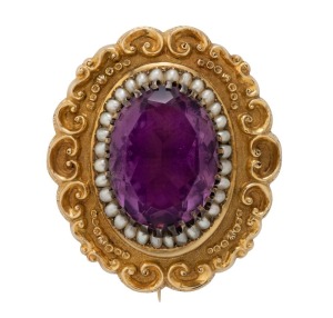 An impressive antique 18ct gold oval shaped brooch set with a large amethyst, surrounded by seed pearls, circa 1850, ​​​​​​​5cm wide, 28.9 grams total