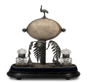An antique Australian silver plated emu egg ink well, 19th century, 29cm high