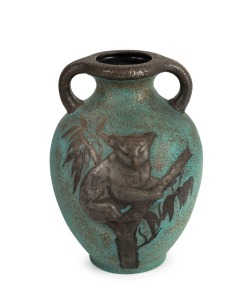 A green ceramic vase with applied silver finished koala, 20th century, 22cm high