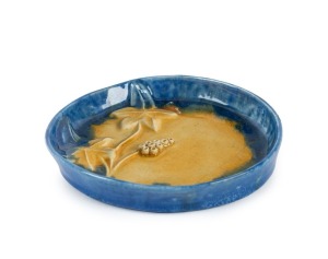 MURIEL FOOTE blue and yellow glazed pottery dish with applied grapes and leaves, incised "M.F.", 18cm wide