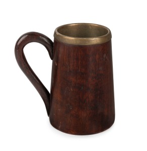 An antique Australian cedar tankard with metal insert, 19th century, 13cm high