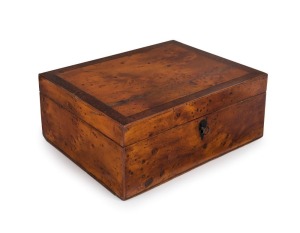 ROBIN HOOD early Tasmanian sewing work box, huon pine and plum pudding blackwood with ebony escutcheon. Interior fitted with huon pine tray and velvet lining, housing a variety of whalebone implements and thread winders made from musk, banksia and myrtle, circa 1838-1840. Bearing paper label "ROBIN HOOD.....HUON HOUSE ELIZABETH STREET HOBART TOWN, VAN DIEMEN'S LAND", 11.5cm high, 28.5cm wide, 23cm deep