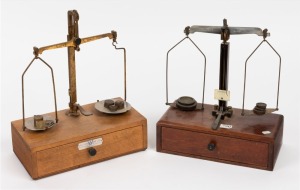 Two sets of vintage and antique scales with assorted weights, 19th and 20th century, the larger 33cm high