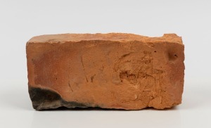 CONVICT BRICK with attached note "Hand Made Convict Brick From House Jos. Lyons, Aust. P.M. In Stanley Tas.", ​​​​​​​23cm wide