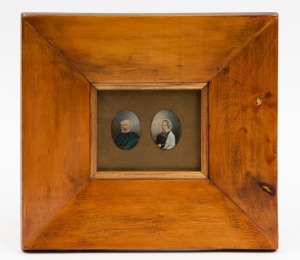 A huon pine picture frame housing a pair of portraits, ​​​​​​​21 x 23cm overall